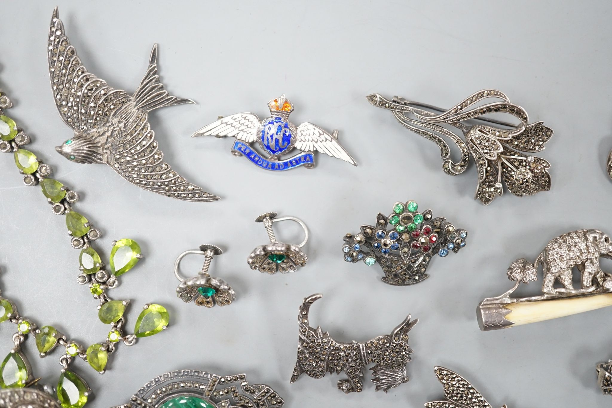 A small collection of assorted mainly white metal and marcasite set jewellery, including brooches, bracelet etc. and an enamelled RAF brooch.